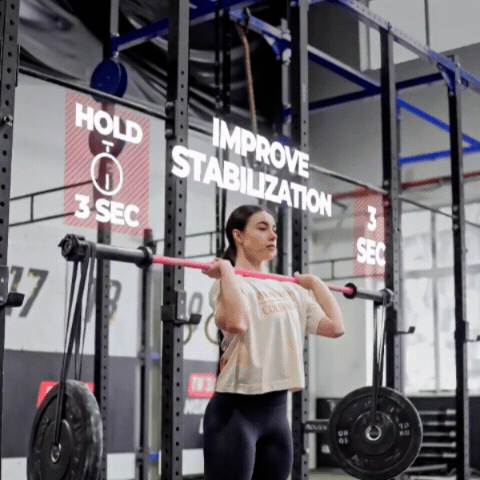 Iryna Dombrovska performing a overhead in the gym (Torokhtiy Weightlifting)