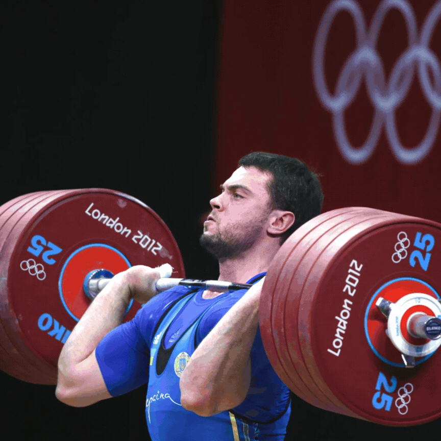 Oleksiy Torokhtiy and Iryna Dombrovska at an Olympic weightlifting events (Torokhtiy Weightlifting)